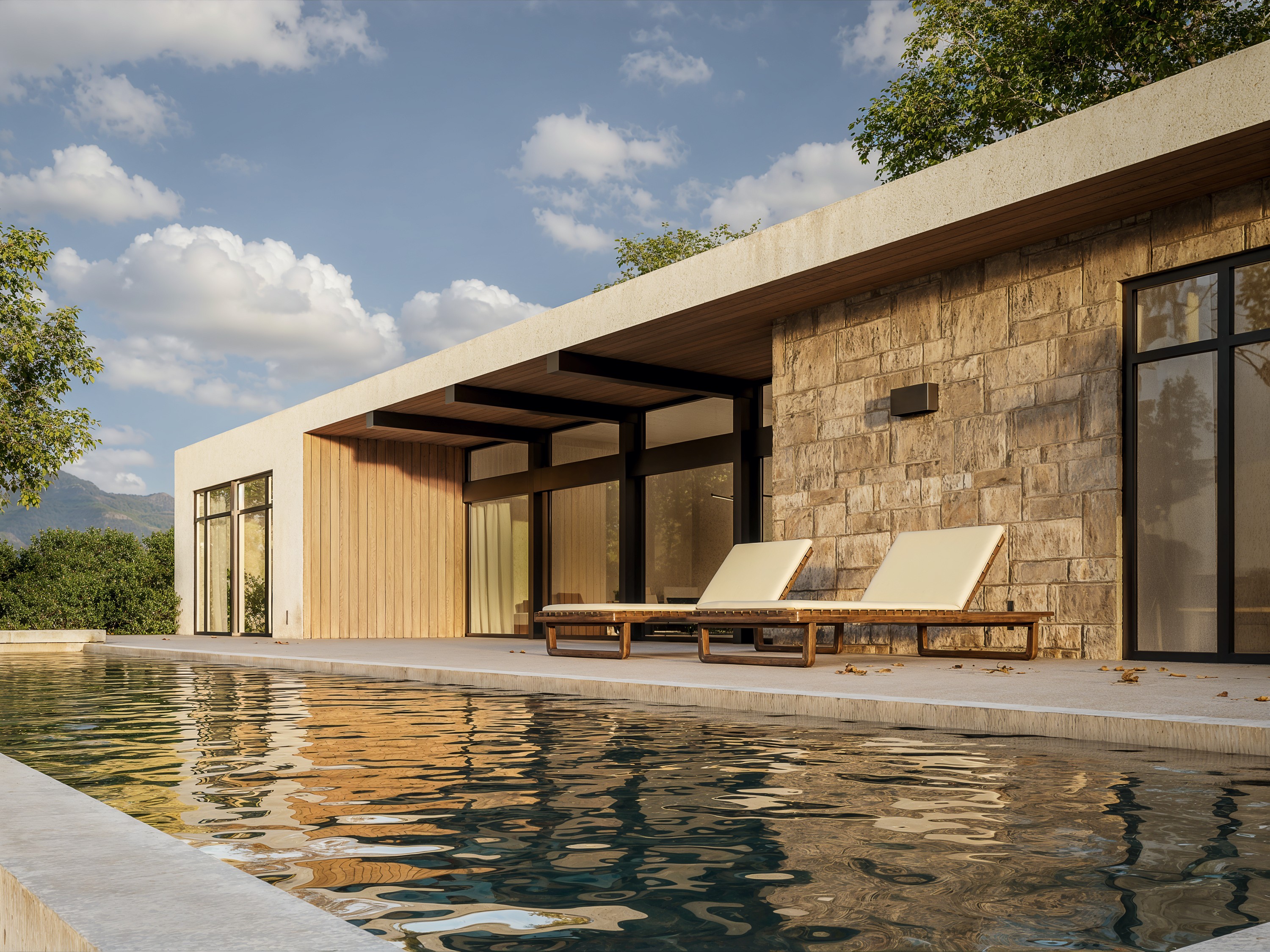 Poolside view of the stone and timber pavilion